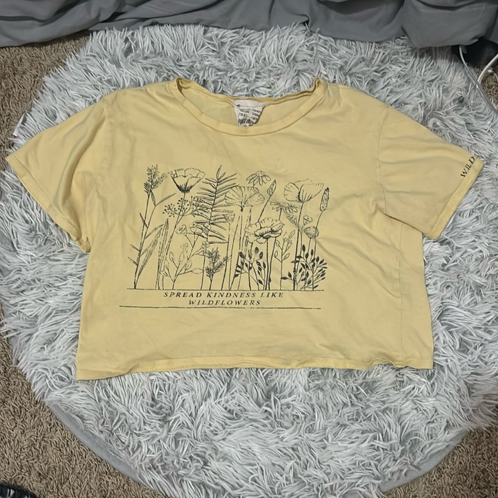 I am selling a women yellow crop t-shirt
